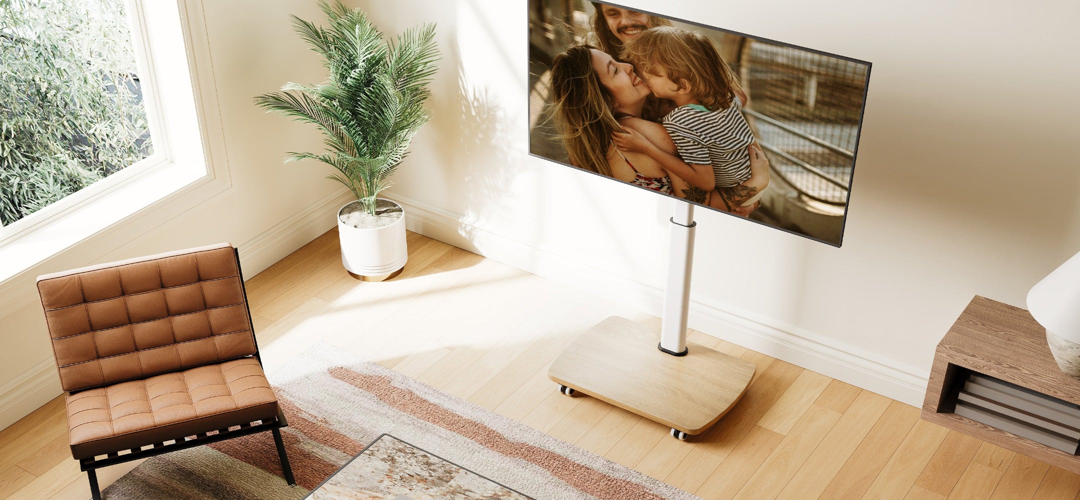 This white TV stand with a sleek wooden base and smooth-rolling casters fits 65 inch TVs , rolling tv stand for your bedroom, living room. The sturdy yet mobile design lets you reposition your TV effortlessly, the neutral white finish blends seamlessly with any decor.